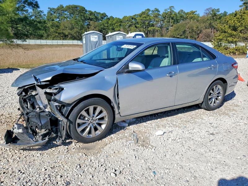 TOYOTA CAMRY LE 2017 with VIN 4T1BF1FK0HU802585 - Photo from auction