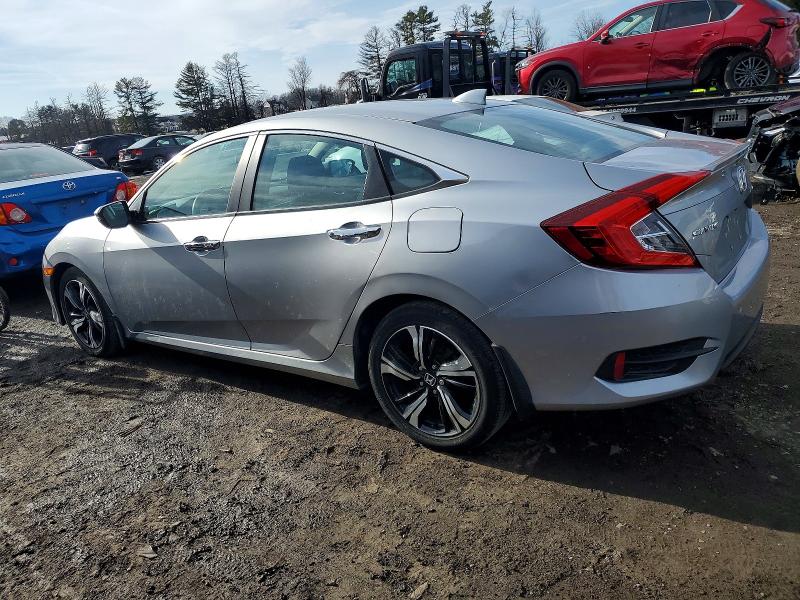 Photo 2 from auction – 2016 HONDA CIVIC TOUR with VIN 19XFC1F99GE038633
