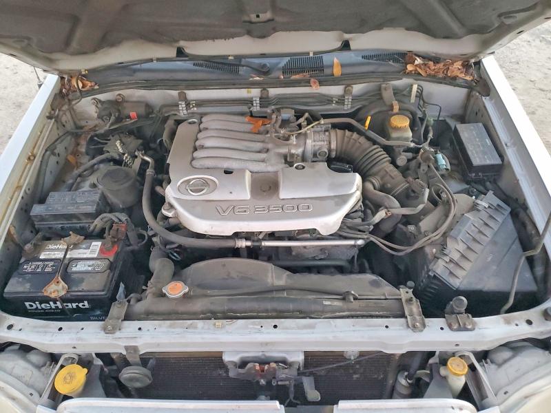 Photo 12 from auction – 2003 NISSAN PATHFINDER with VIN JN8DR09Y23W833367