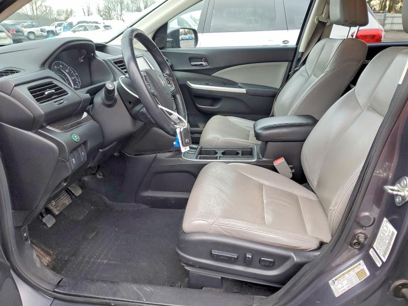 Photo 7 from auction – 2015 HONDA CR-V with VIN 2HKRM4H74FH613271