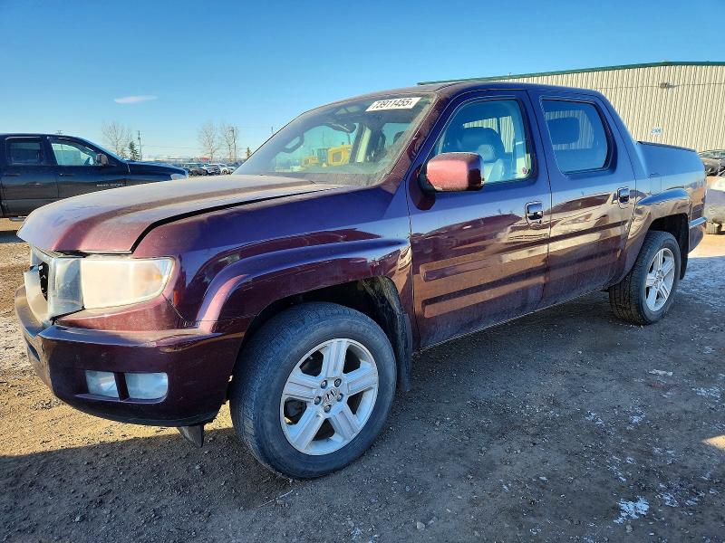 HONDA RIDGELINE 2013 with VIN 5FPYK1F56DB502841 - Photo from auction