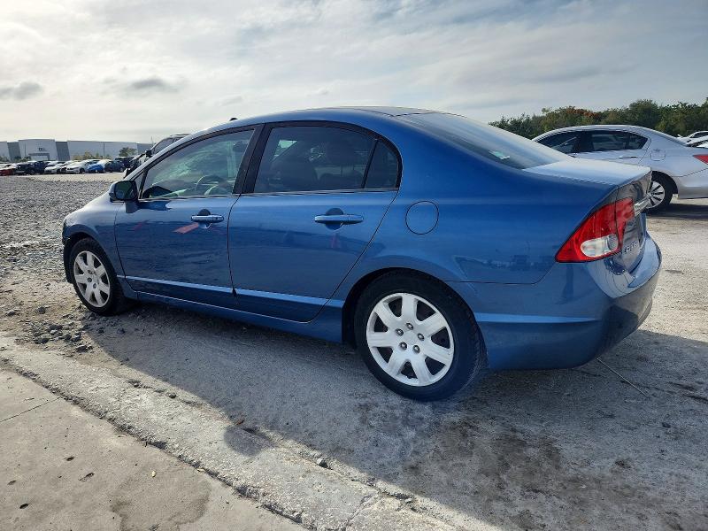 Photo 2 from auction – 2011 HONDA CIVIC LX with VIN 19XFA1F54BE028264