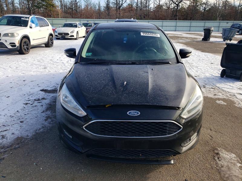 Photo 5 from auction – 2016 FORD FOCUS with VIN 1FADP3F25GL237055