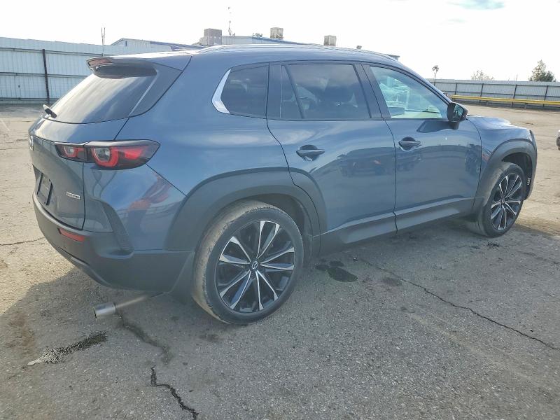 Photo 3 from auction – 2023 MAZDA CX-50 PREM with VIN 7MMVABEM3PN101430