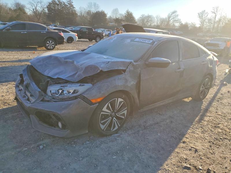 HONDA CIVIC SI 2017 with VIN 2HGFC1E54HH703525 - Photo from auction