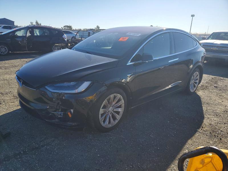 TESLA MODEL X 2018 with VIN 5YJXCDE28JF104522 - Photo from auction