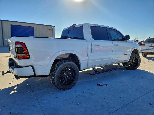 Photo 3 from auction – 2021 RAM 1500 with VIN 1C6SRFJT6MN590280