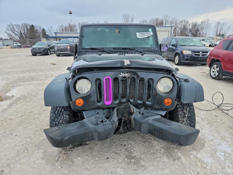 Photo 5 from auction – 2011 JEEP WRANGLER U with VIN 1J4BA3H10BL623229