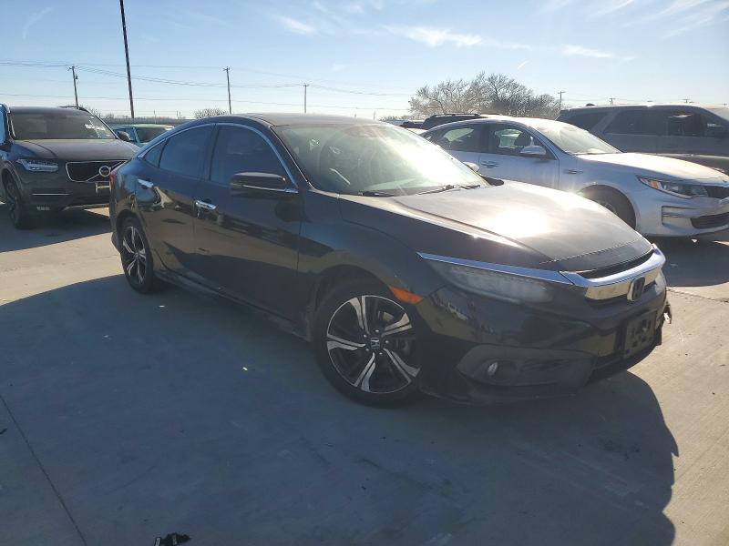 Photo 4 from auction – 2016 HONDA CIVIC with VIN 2HGFC1F91GH639511