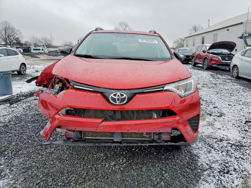 Photo 5 from auction – 2016 TOYOTA RAV4 with VIN JTMBFREV5GJ086197