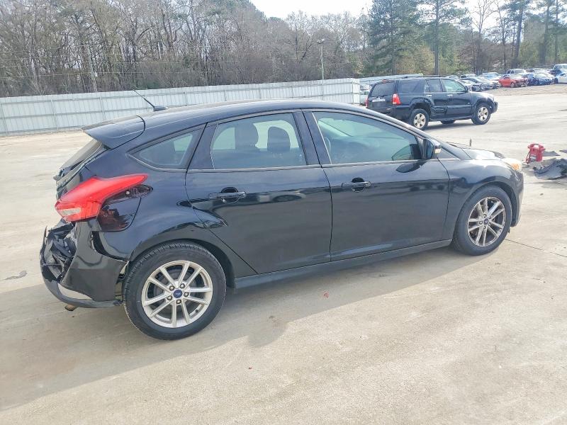 Photo 3 from auction – 2016 FORD FOCUS SE with VIN 1FADP3K25GL279599