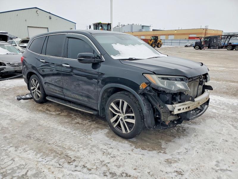 Photo 4 from auction – 2016 HONDA PILOT with VIN 5FNYF6H93GB504934