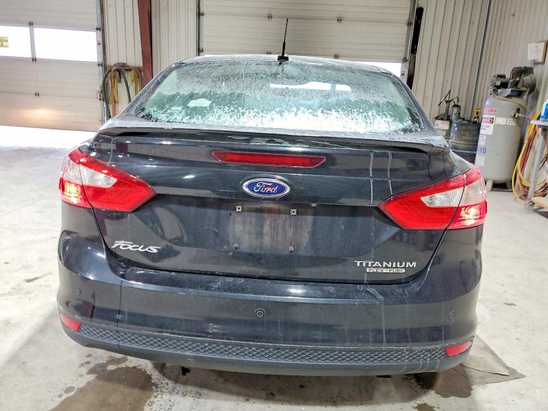 Photo 6 from auction – 2014 FORD FOCUS TITA with VIN 1FADP3J26EL115535