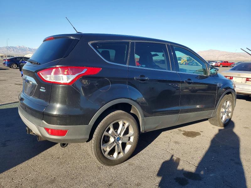 Photo 3 from auction – 2013 FORD ESCAPE SEL with VIN 1FMCU9H93DUB65124