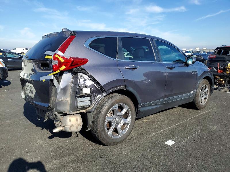 Photo 3 from auction – 2017 HONDA CR-V EXL with VIN 7FARW1H88HE011674