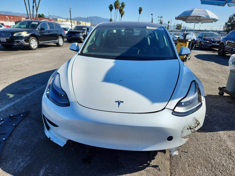 Photo 5 from auction – 2023 TESLA MODEL 3 with VIN 5YJ3E1EA3PF560564
