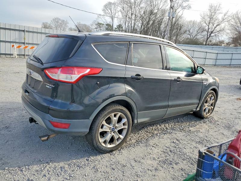 Photo 3 from auction – 2014 FORD ESCAPE TIT with VIN 1FMCU9JX9EUB19923