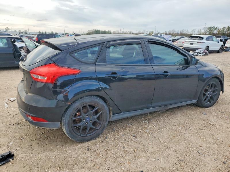 Photo 3 from auction – 2016 FORD FOCUS SE with VIN 1FADP3K26GL326106