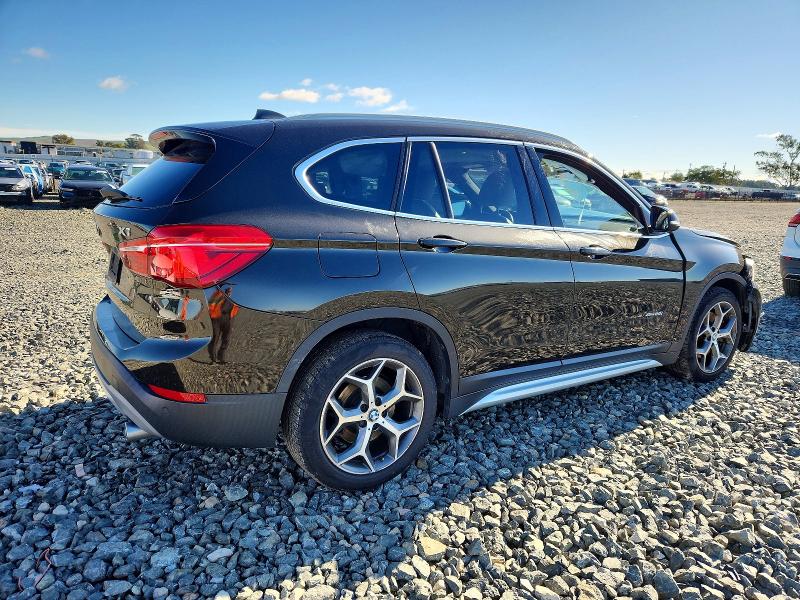 Photo 3 from auction – 2017 BMW X1 XDRIVE2 with VIN WBXHT3C32H5F83578