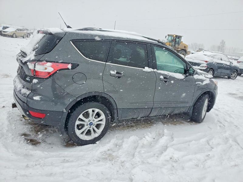 Photo 3 from auction – 2018 FORD ESCAPE SE with VIN 1FMCU9GD9JUC81929