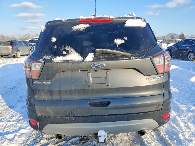 Photo 6 from auction – 2017 FORD ESCAPE TIT with VIN 1FMCU9J90HUB15054