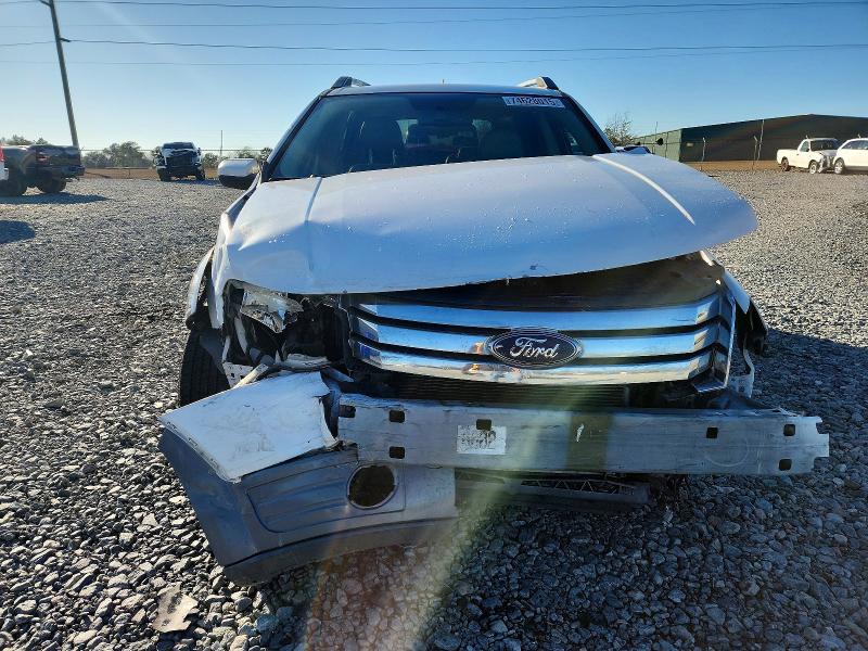 Photo 5 from auction – 2008 FORD TAURUS X S with VIN 1FMDK02W68GA28512