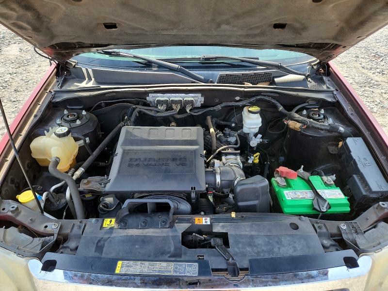 Photo 12 from auction – 2011 FORD ESCAPE LIM with VIN 1FMCU0EG7BKA78673