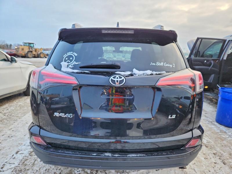 Photo 6 from auction – 2018 TOYOTA RAV4 LE with VIN 2T3ZFREV1JW508764
