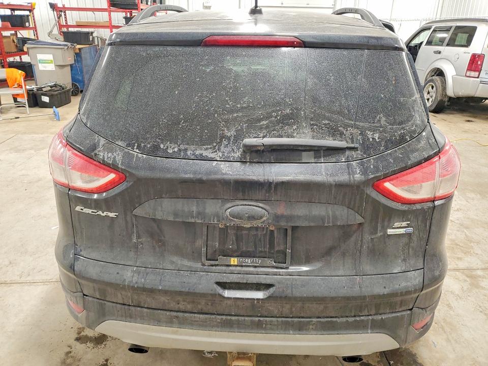 Photo 6 from auction – 2015 FORD ESCAPE SE with VIN 1FMCU9G98FUB62577