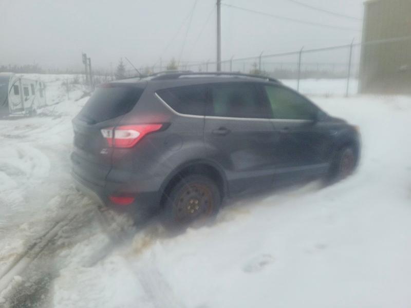Photo 3 from auction – 2018 FORD ESCAPE SE with VIN 1FMCU9GD0JUD23906