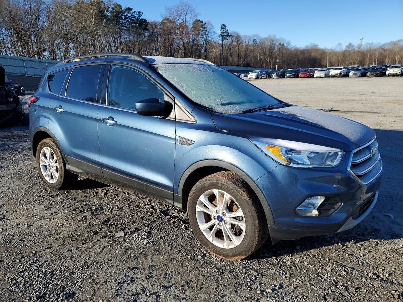 Photo 4 from auction – 2018 FORD ESCAPE with VIN 1FMCU0GD3JUA50701