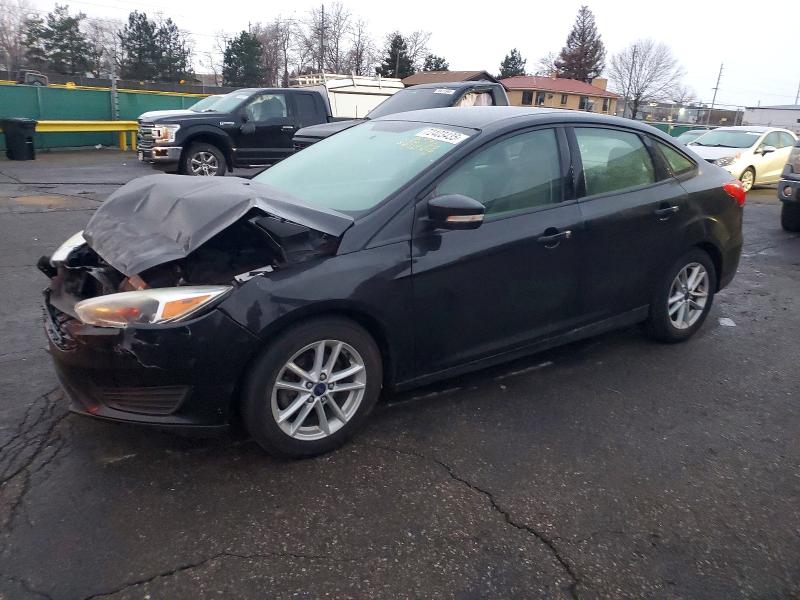 FORD FOCUS SE 2015 with VIN 1FADP3F23FL300801 - Photo from auction