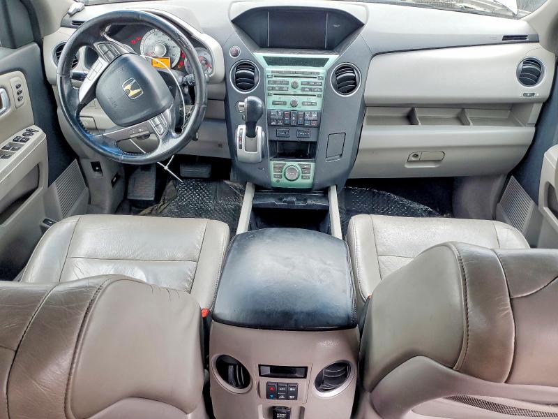 Photo 8 from auction – 2010 HONDA PILOT TOUR with VIN 5FNYF3H95AB018454