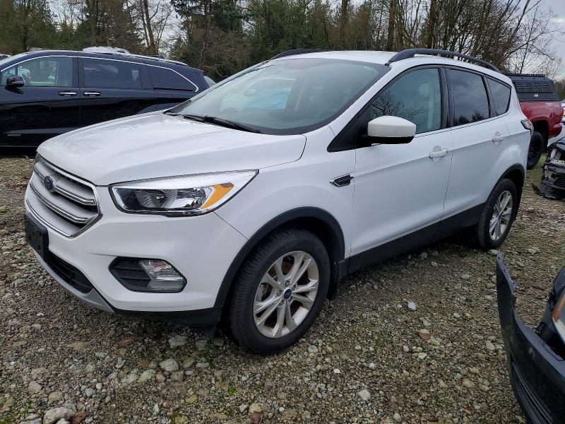 FORD ESCAPE SE 2018 with VIN 1FMCU0GD0JUC72273 - Photo from auction