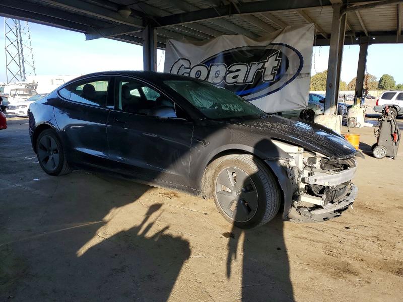 Photo 4 from auction – 2023 TESLA MODEL 3 with VIN 5YJ3E1EA1PF448054