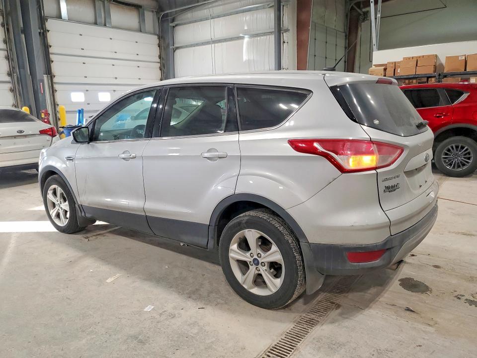 Photo 2 from auction – 2016 FORD ESCAPE SE with VIN 1FMCU9GXXGUA98204