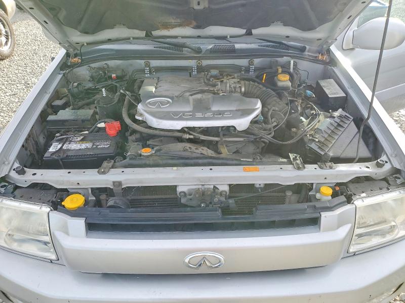 Photo 12 from auction – 2003 INFINITI QX4 with VIN JNRDR09Y03W302308