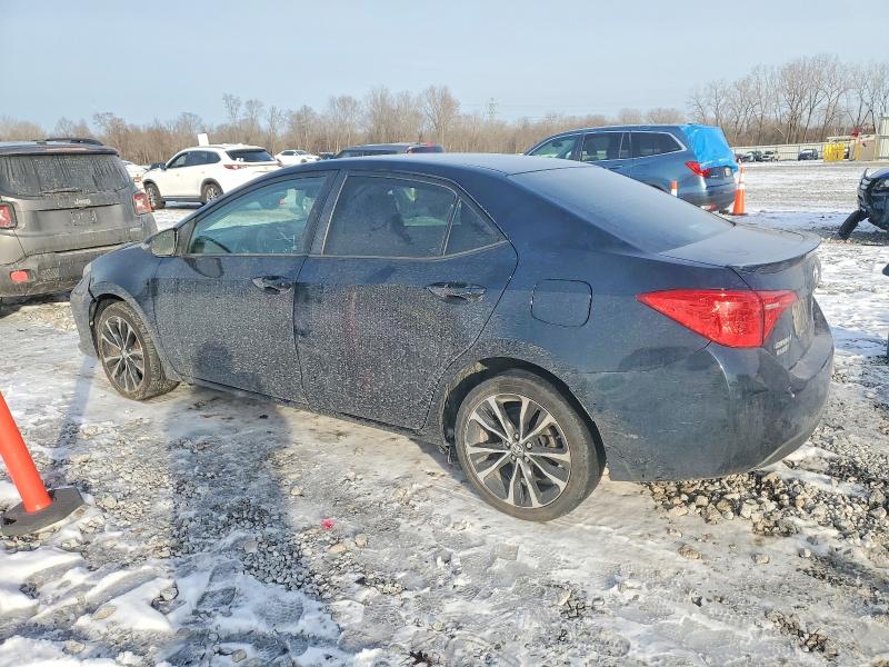 Photo 2 from auction – 2017 TOYOTA COROLLA with VIN 2T1BURHE3HC884034