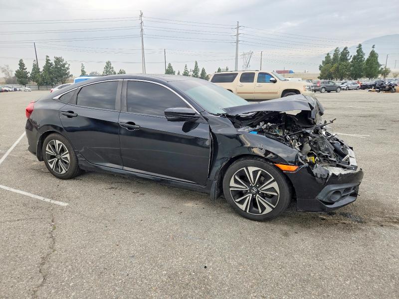Photo 4 from auction – 2017 HONDA CIVIC with VIN 19XFC1E30HE031858