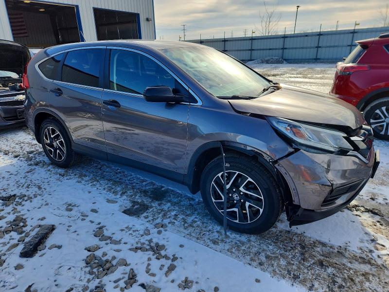 Photo 4 from auction – 2016 HONDA CR-V SE with VIN 5J6RM4H4XGL087113