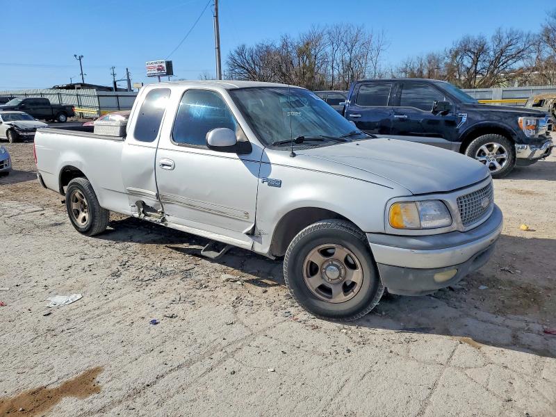 Photo 4 from auction – 2003 FORD F150 with VIN 1FTRX17223NA15249