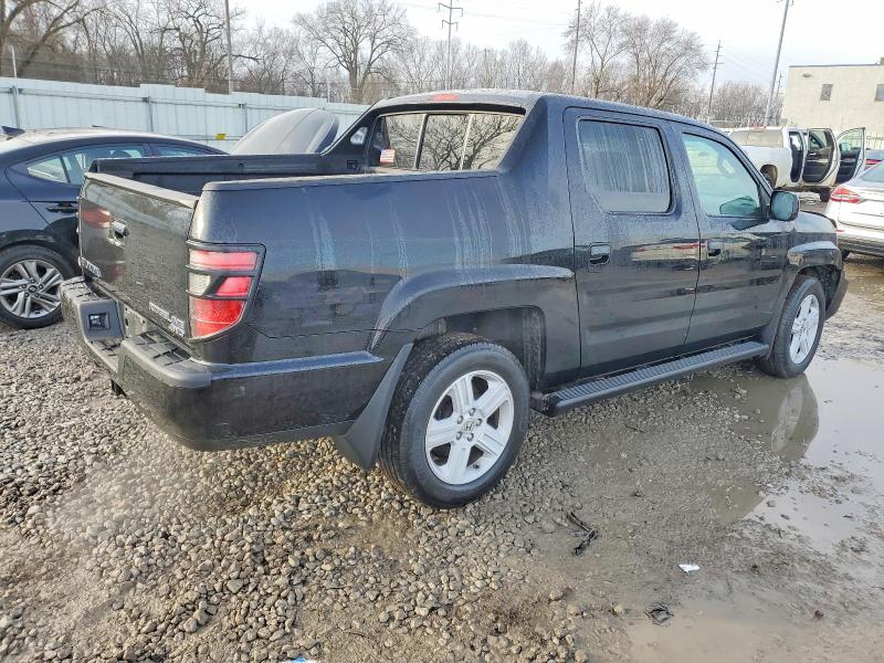 Photo 3 from auction – 2013 HONDA RIDGELINE with VIN 5FPYK1F56DB009869