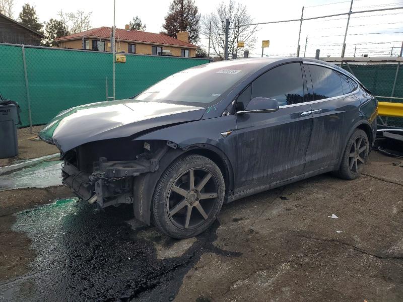 TESLA MODEL X 2018 with VIN 5YJXCBE23JF104447 - Photo from auction