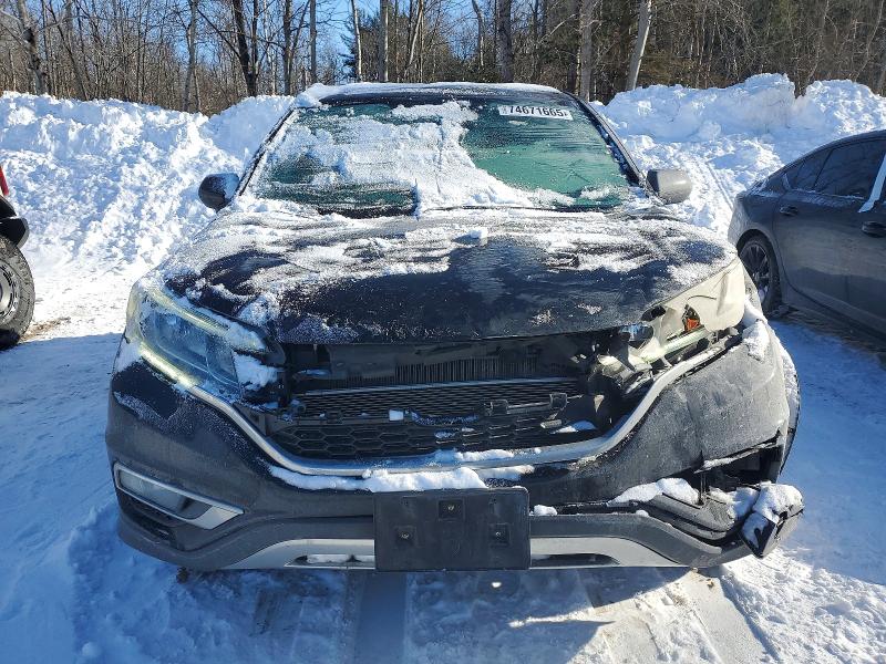Photo 5 from auction – 2015 HONDA CR-V EX with VIN 2HKRM4H54FH113271