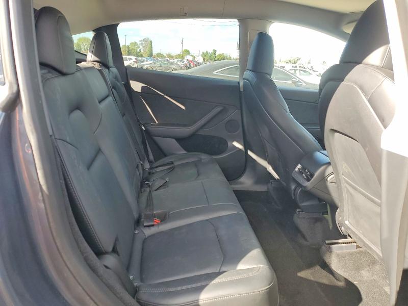 Photo 11 from auction – 2023 TESLA MODEL Y with VIN 7SAYGDEE1PA054249