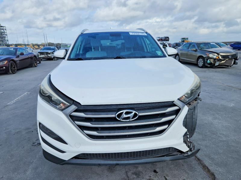 Photo 5 from auction – 2017 HYUNDAI TUCSON with VIN KM8J33A47HU294530