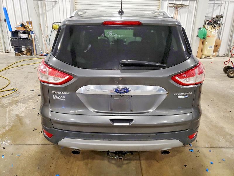Photo 6 from auction – 2016 FORD ESCAPE TIT with VIN 1FMCU9JX3GUB20990