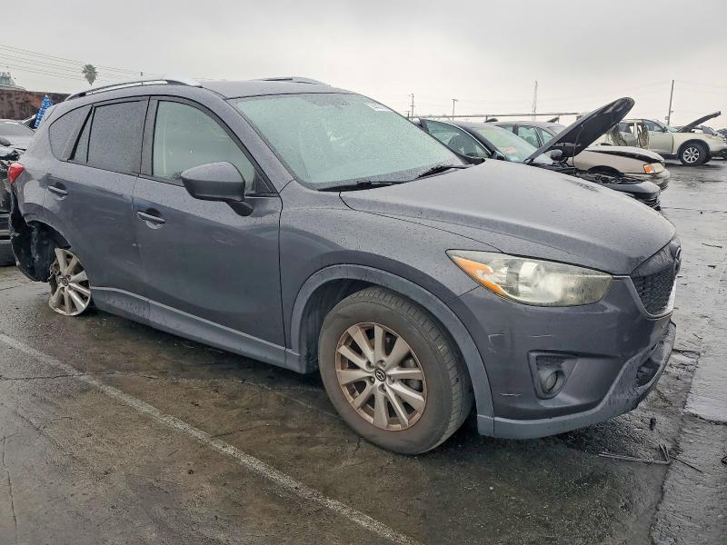 Photo 4 from auction – 2014 MAZDA CX-5 with VIN JM3KE2CY3E0328048