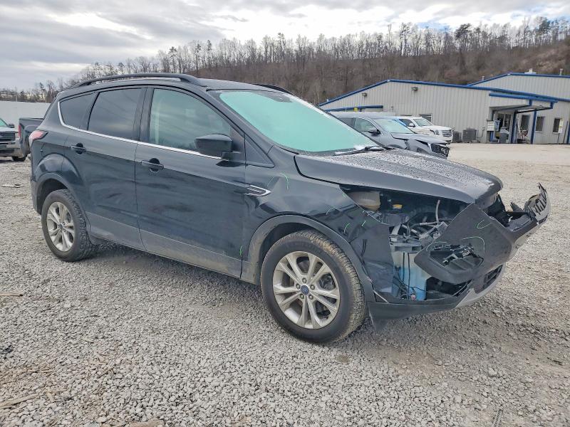 Photo 4 from auction – 2018 FORD ESCAPE SE with VIN 1FMCU9GD2JUA32307