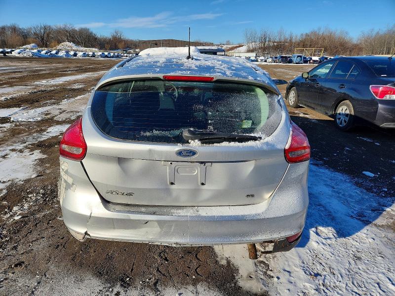 Photo 6 from auction – 2016 FORD FOCUS with VIN 1FADP3K29GL338640